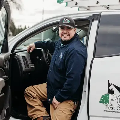 technician next to truck